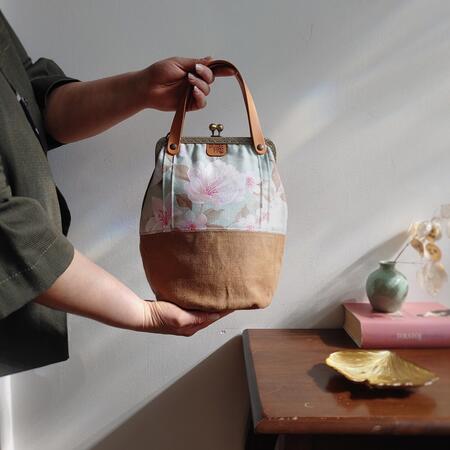Violet - borsa a secchiello tessuto floreale verde menta e sabbia