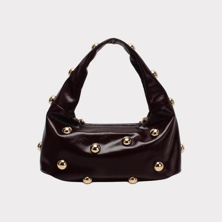 Borsa a spalla con sfera decorativa e chiusura con zip