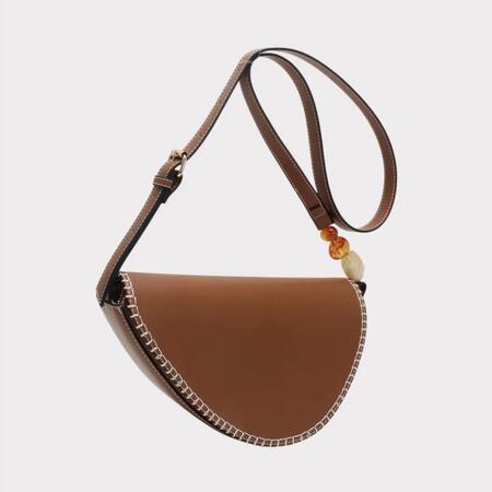 Borsa a tracolla a forma di mandorla con pietra decorativa