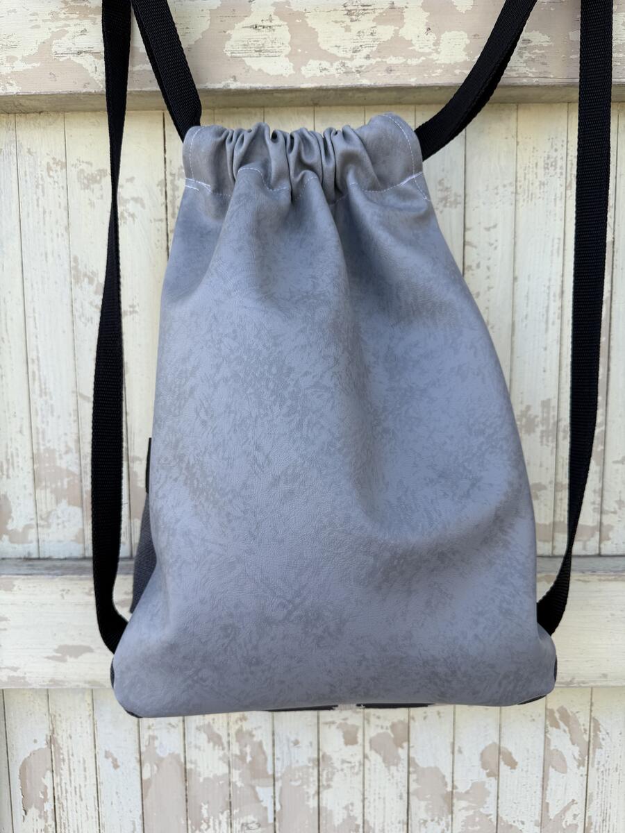 Zaino grigio e beige