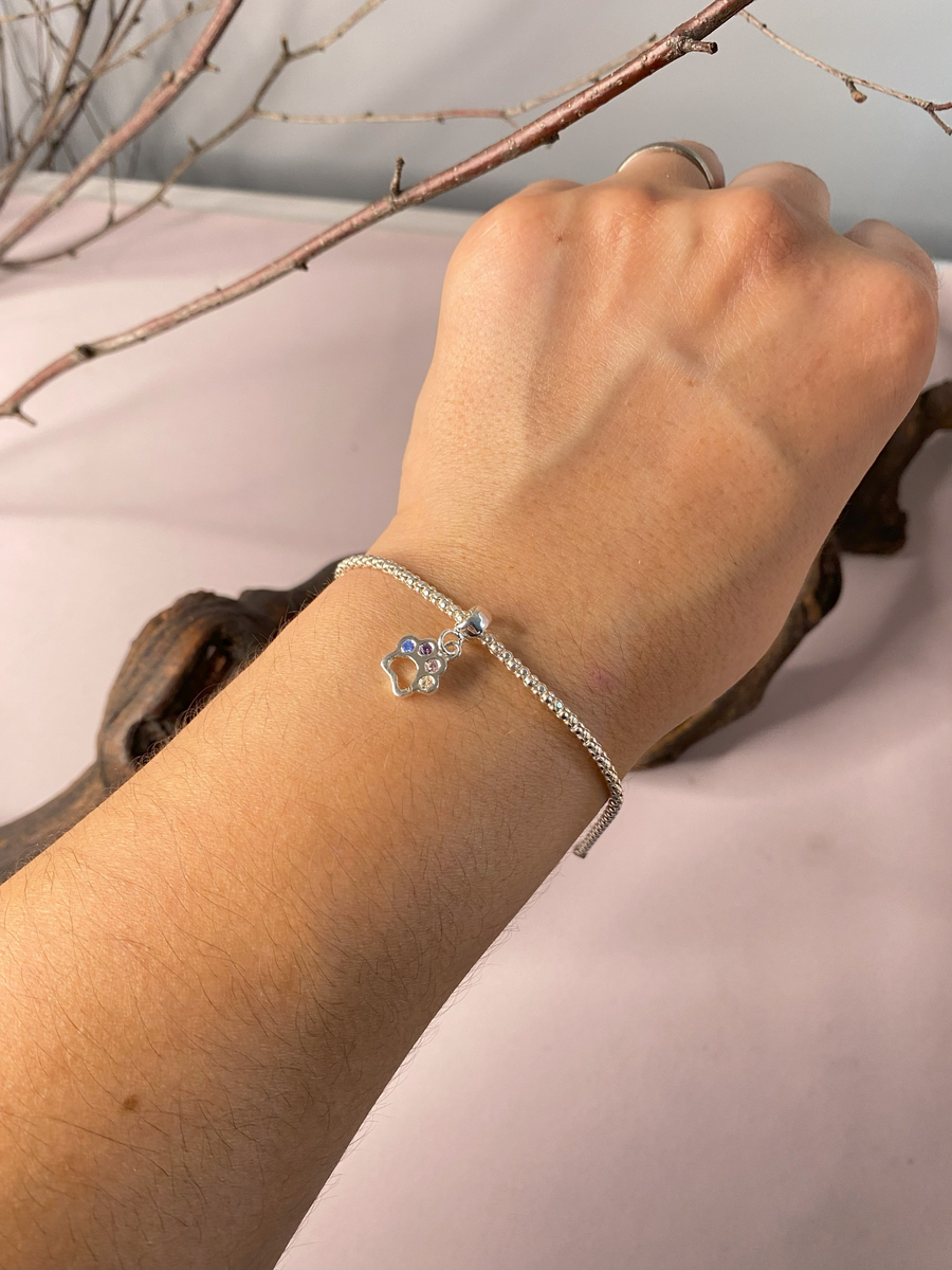 Zampetta, Charm y Pulsera