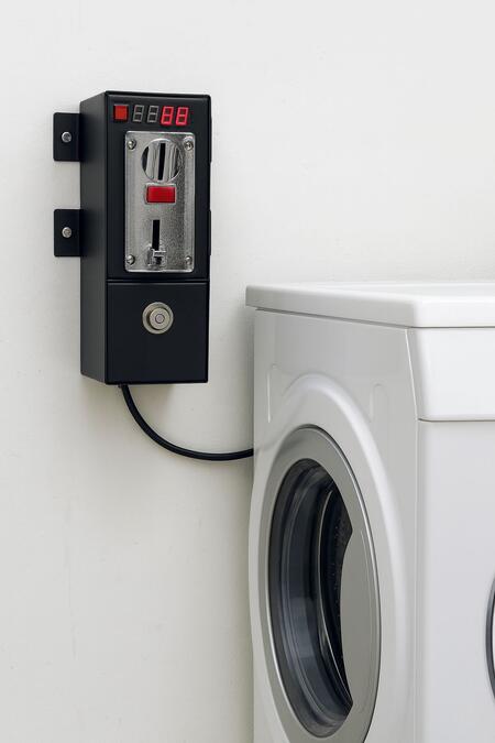 Gettoniera per Lavatrice Domestica con Staffe di Fissaggio a Parete – Controllo a Tempo per B&B e Strutture Ricettive (max 1900W)
