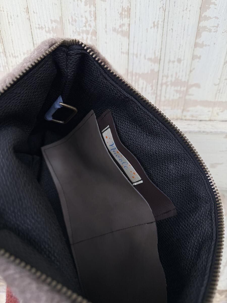 Clutch righe bordeaux e beige