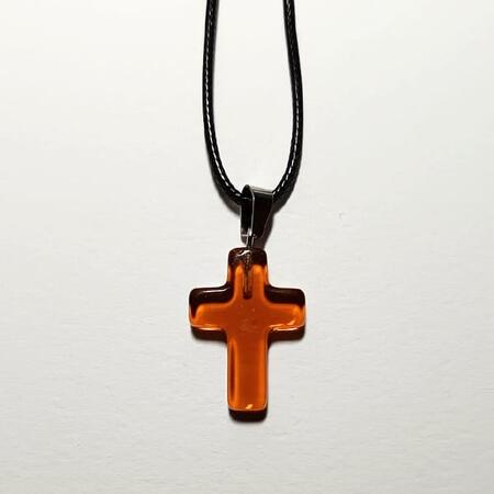 Croce  in vetro ambra con cordino