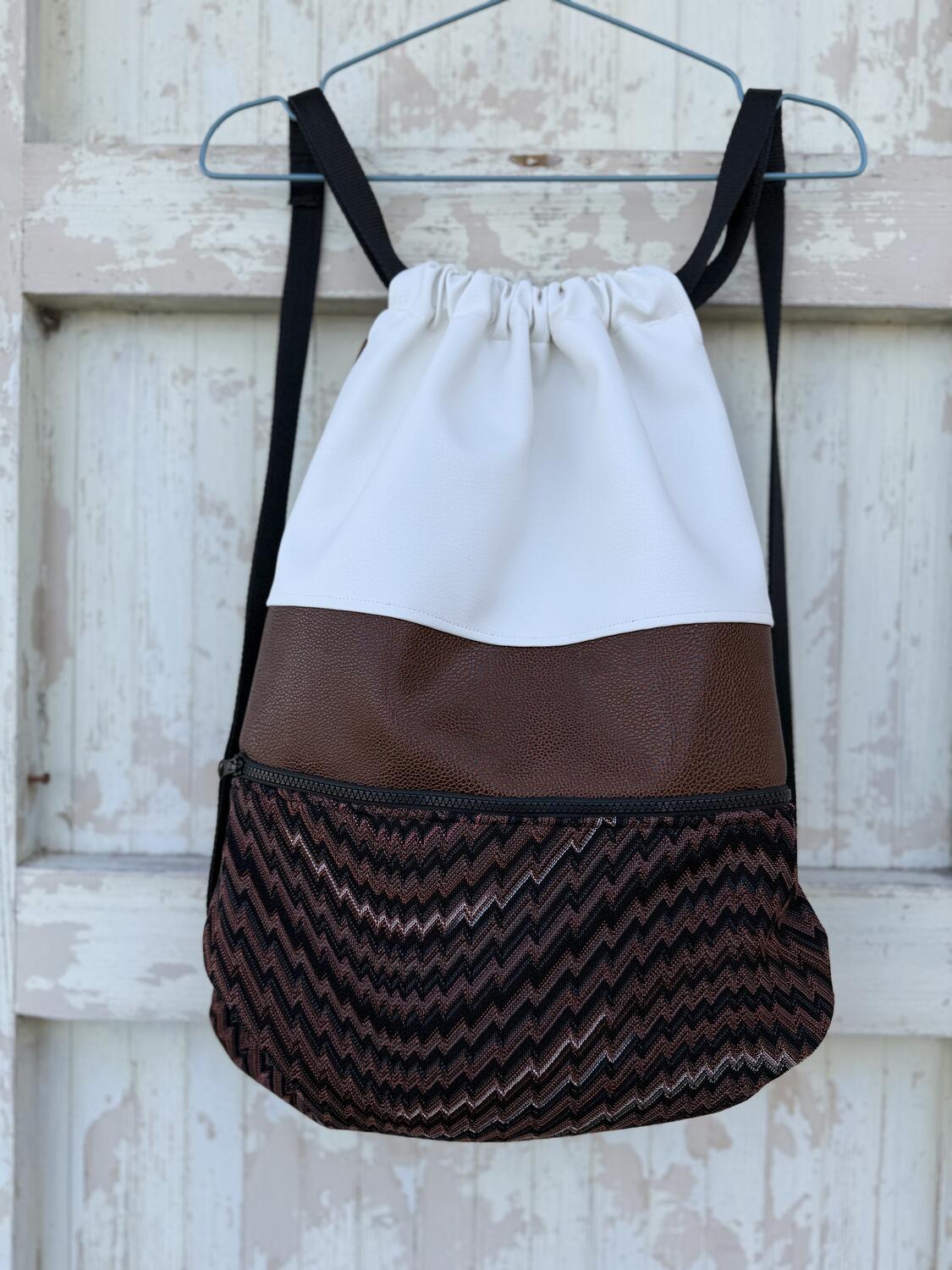 Zaino marrone e bianco 