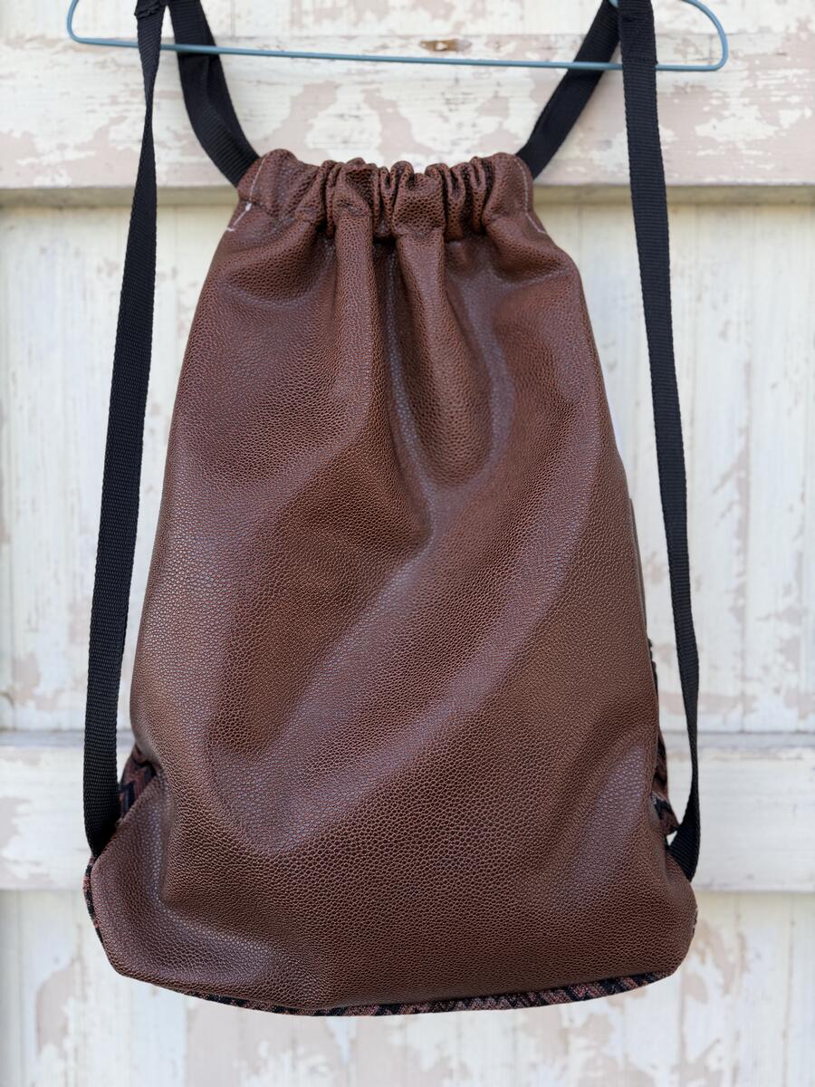 Zaino marrone e bianco 