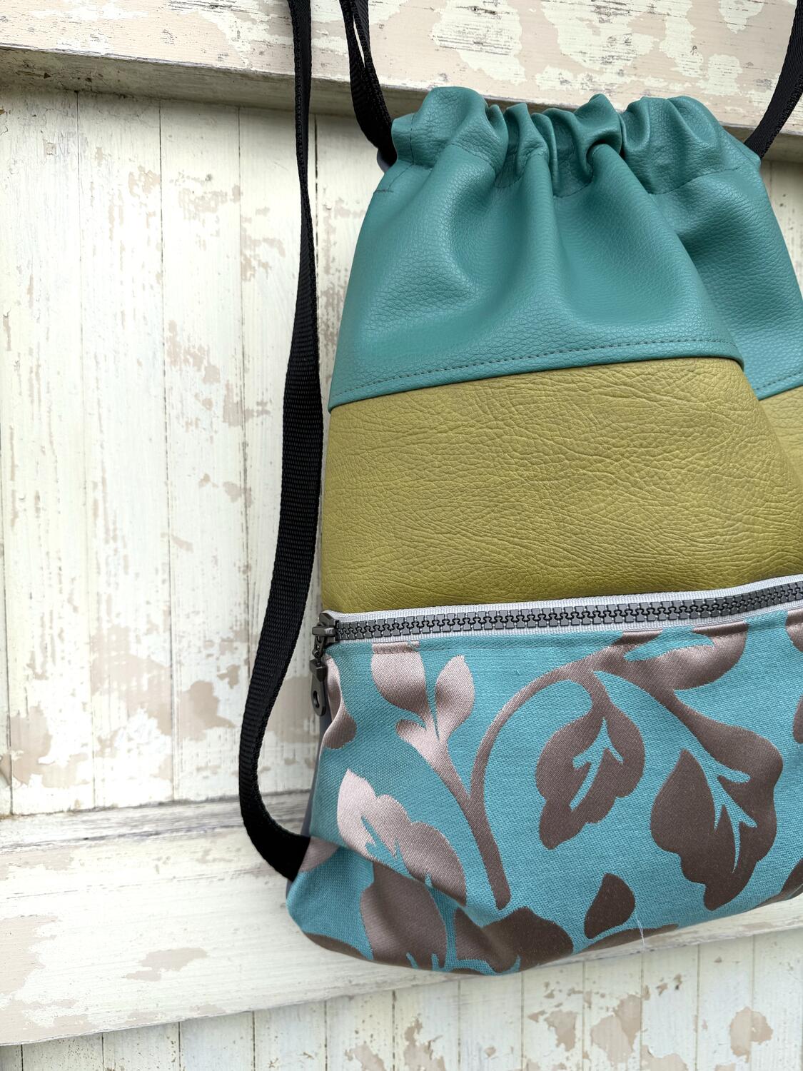 Zaino verde acqua e ocra