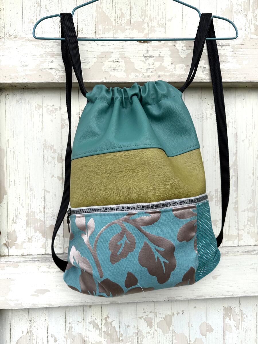 Zaino verde acqua e ocra