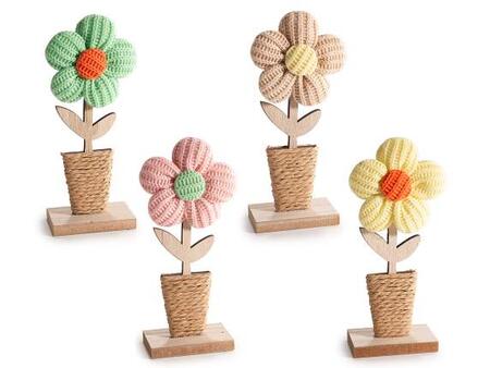 Fiore lavorato a maglia colorata su vasetto in legno e corda