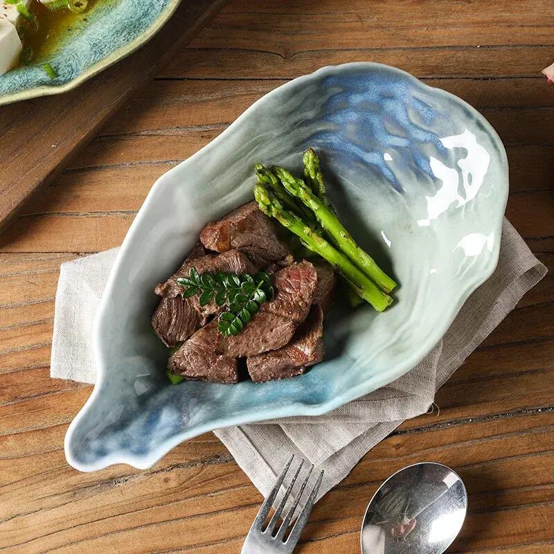 Piatto forma conchiglia in ceramica colore verde perlato pz.1