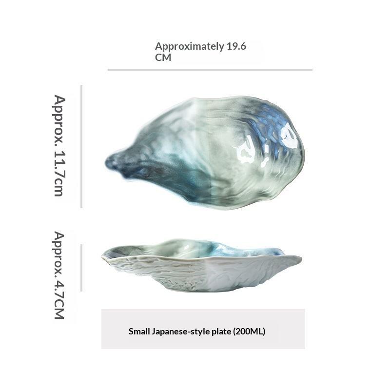 Piatto forma conchiglia in ceramica colore verde perlato pz.1