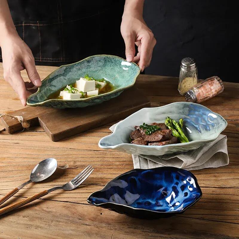 Piatto forma conchiglia in ceramica colore verde perlato pz.1