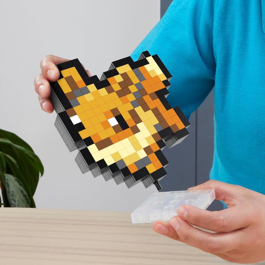 MEGA Pokémon - Eevee Pixel Art, set da costruire con 323 pezzi e stile retrò pixelato, personaggio da esporre con base inclusa o da appendere a parete, giocattolo per collezionisti, 13+ anni, HTH78