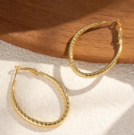 Creoli ovali dorati acciaio inossidabile luce eleganza chic