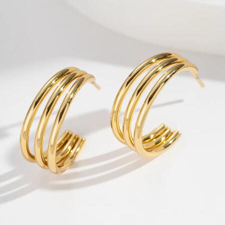 Eleganti cerchi tripli dorati in acciaio inossidabile