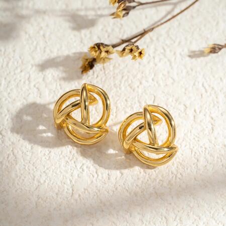 Orecchini a nodo dorato in acciaio inossidabile intrecci eleganti