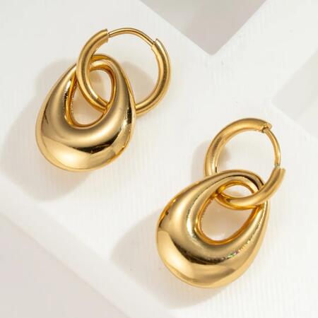 Orecchini dorati scultorei moderni in acciaio inossidabile