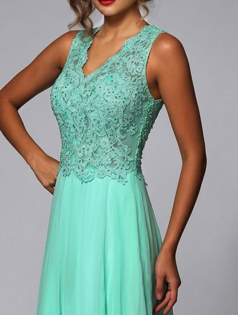 0341 ABITO A IMPERO IN CHIFFON VERDE MENTA CON PIZZO NEL SENO