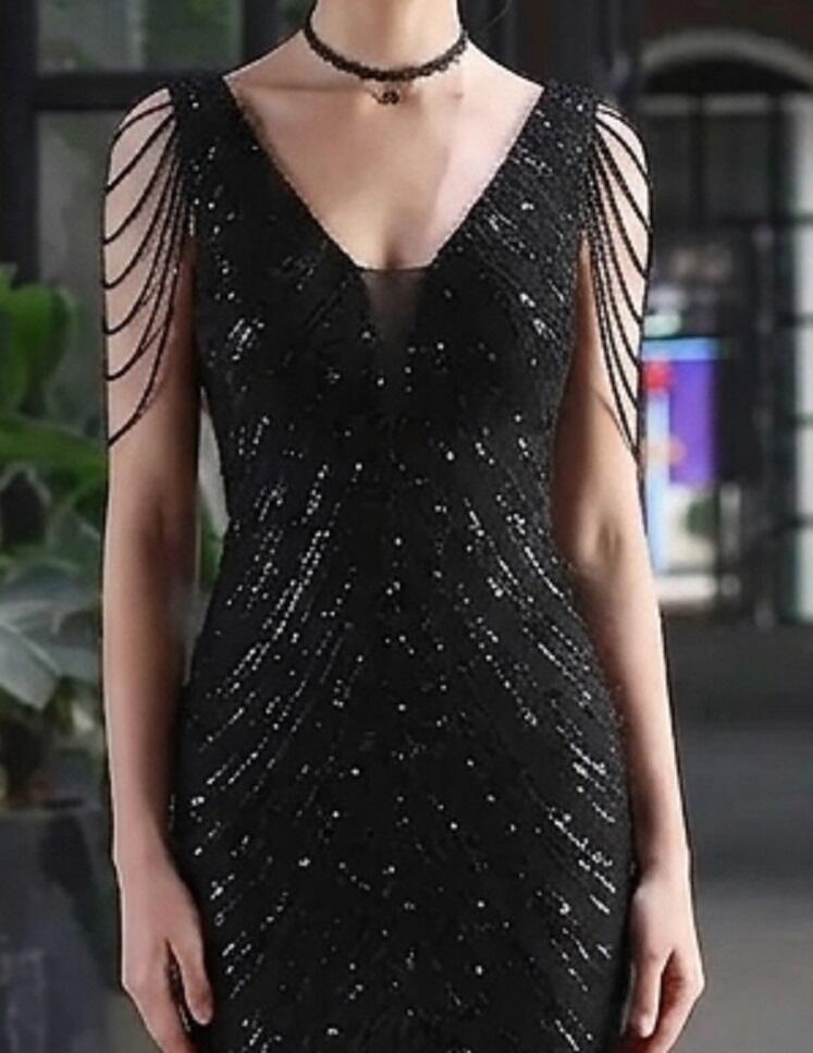 0985 Abito lungo in micropaillettes nero con perline sulle braccia