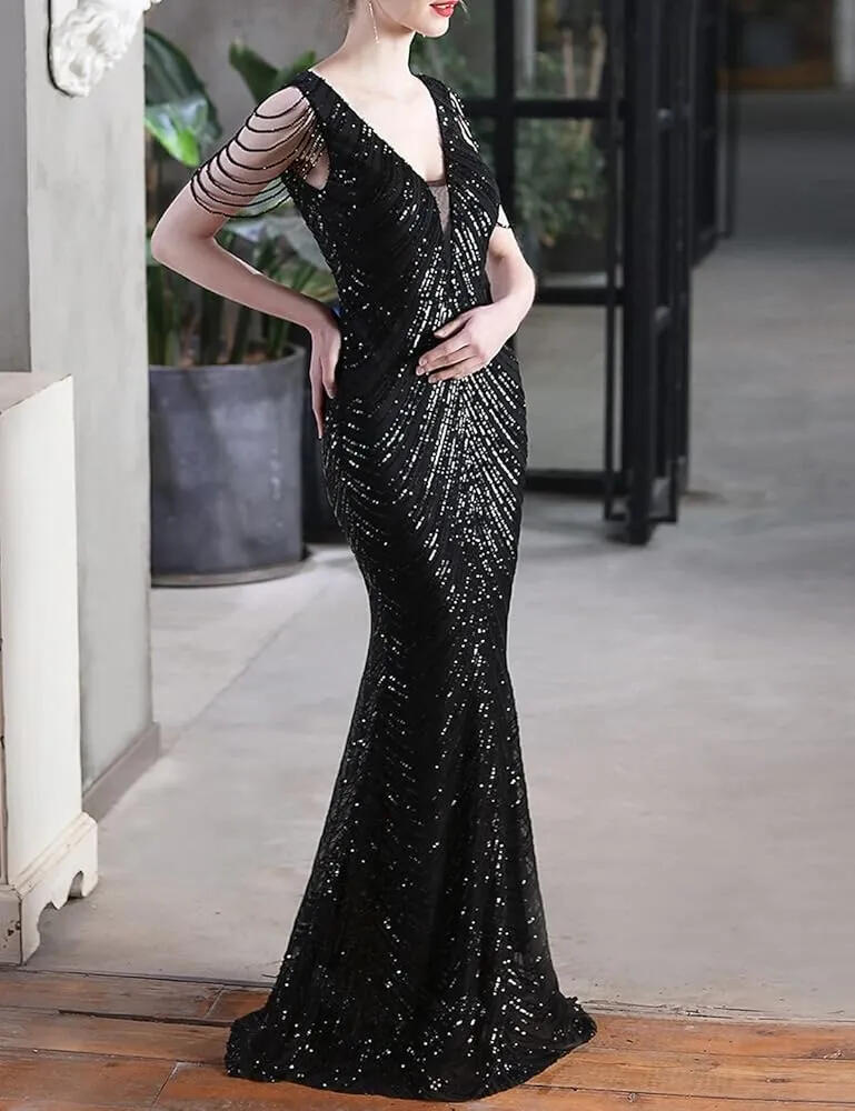 0985 Abito lungo in micropaillettes nero con perline sulle braccia