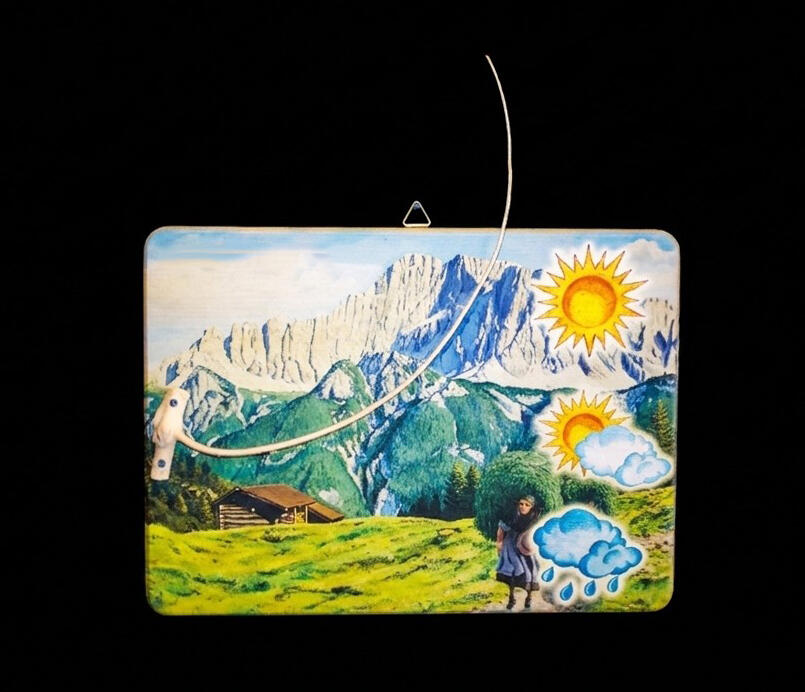 Barometro naturale con Monte civetta e donna con gerla