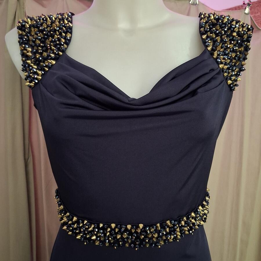 1027 Long dress in dark blue lycra jersey with gold rhinestones and studs