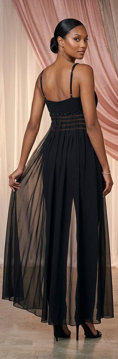 0762 Knit jumpsuit featuring sheer chiffon panels with small stones and side fringe.