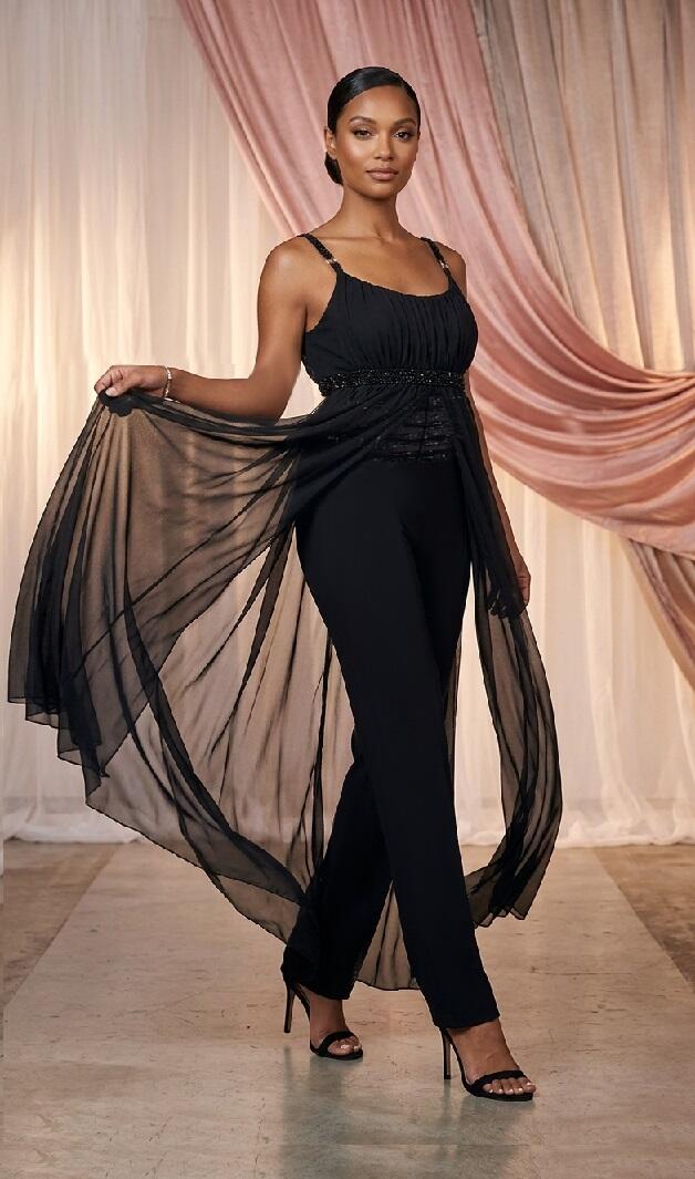 0762 Knit jumpsuit featuring sheer chiffon panels with small stones and side fringe.