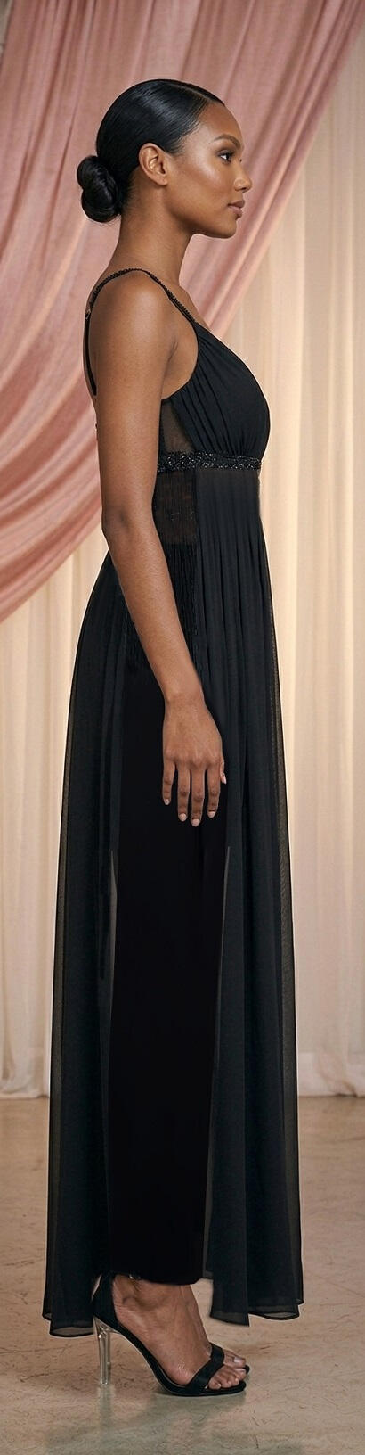 0762 Knit jumpsuit featuring sheer chiffon panels with small stones and side fringe.