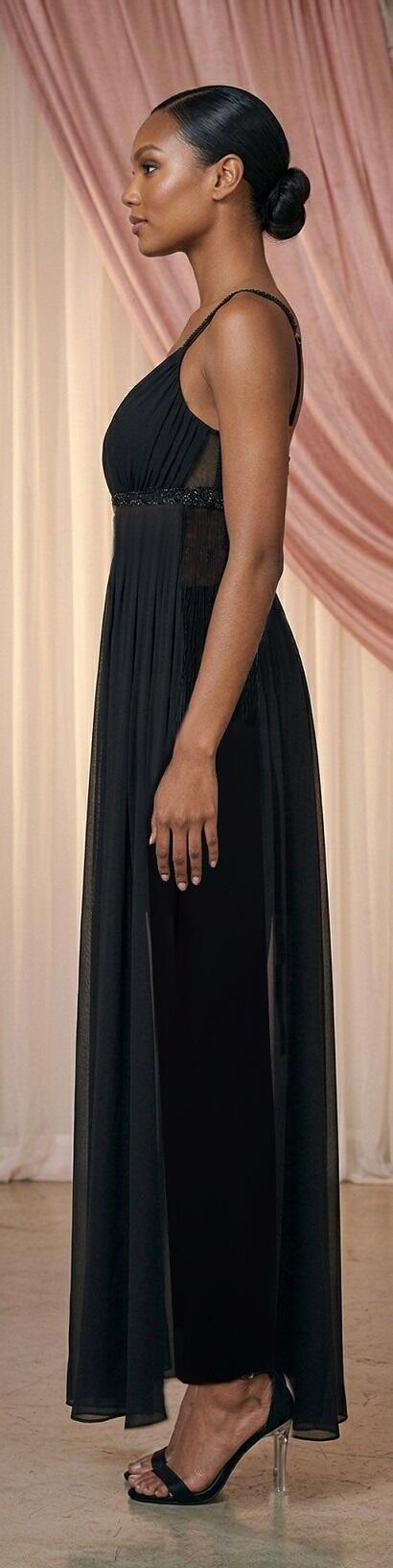 0762 Knit jumpsuit featuring sheer chiffon panels with small stones and side fringe.