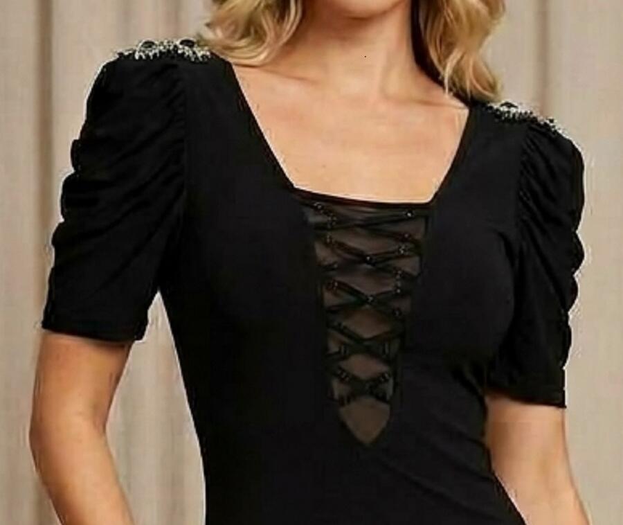 1062 Tubino nero in jersey elastico con dettagli in tulle trasparente linea Disco