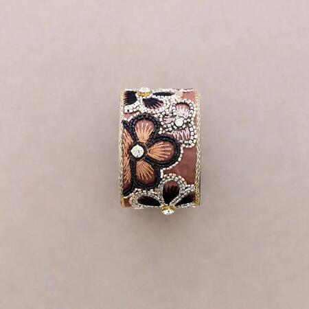 Bracciale regolabile con fiori di paillettes
