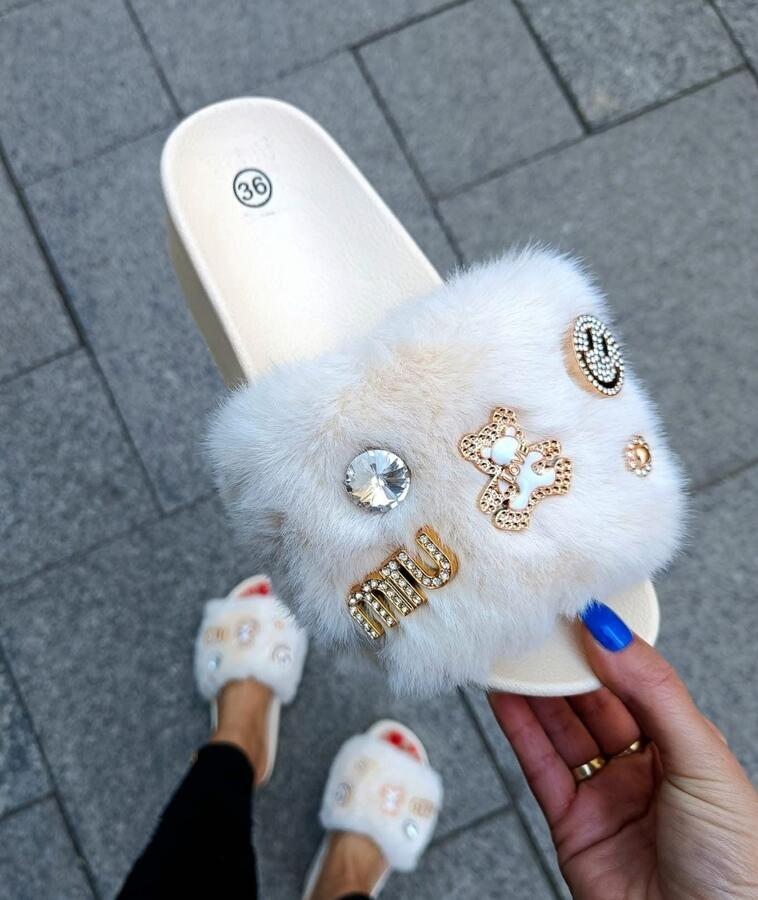 Pantofole modello slide in ecopelliccia morbida con charme dal 36 a 41