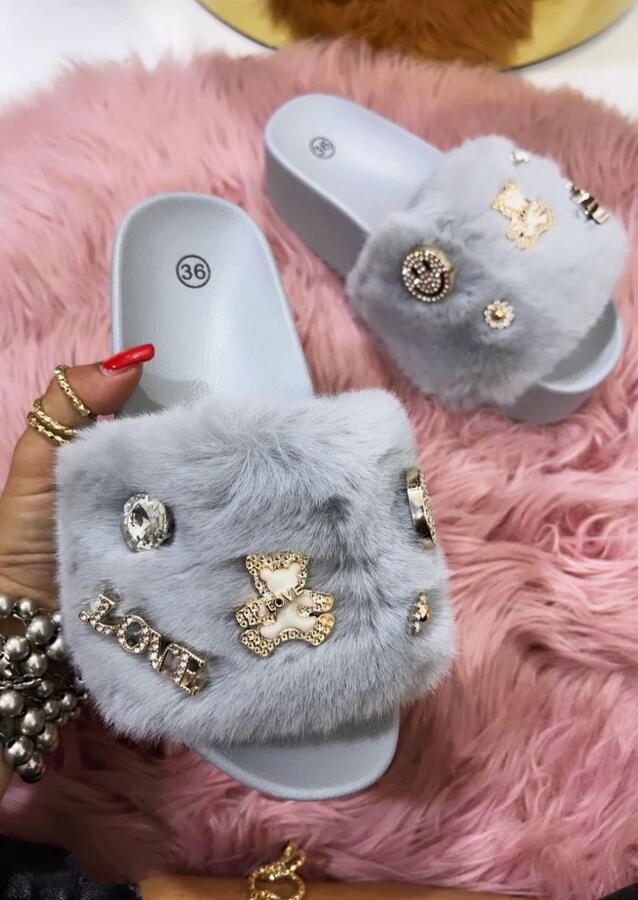 Pantofole modello slide in ecopelliccia morbida con charme dal 36 a 41